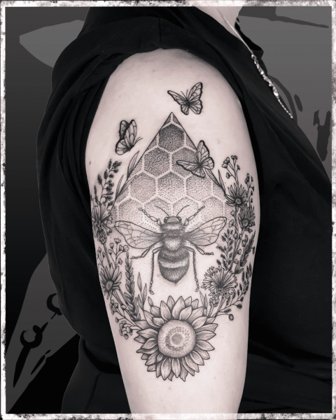geometric dotwork tattoo